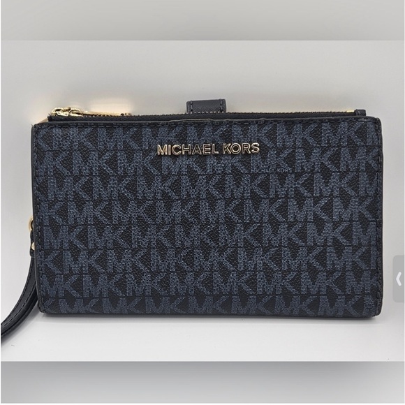 Michael Kors Handbags - Michael Kors Jet Set Travel Lg Double Zip Wristlet